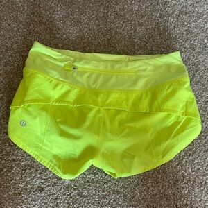 Size 0 highlight yellow speed up shorts low rise.